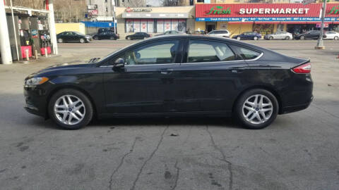 2014 Ford Fusion for sale at BLS AUTO SALES LLC in Bronx NY