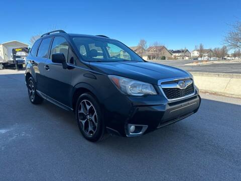 2015 Subaru Forester for sale at The Car-Mart in Bountiful UT
