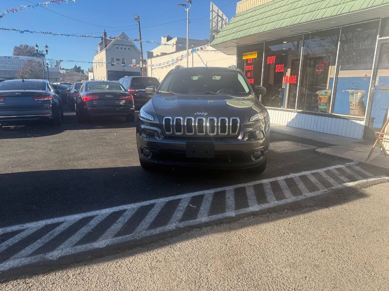 2015 Jeep Cherokee for sale at MBM Group LLC Auto Sales in Kearny, NJ