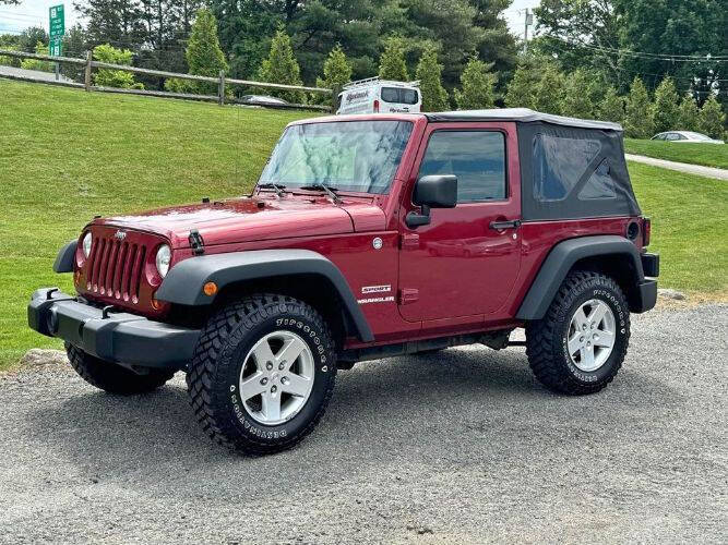 2013 Jeep Wrangler for sale at Classic Car Deals in Cadillac MI