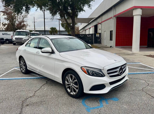 2015 Mercedes-Benz C-Class for sale at Zoom Auto Exchange LLC in Orlando, FL