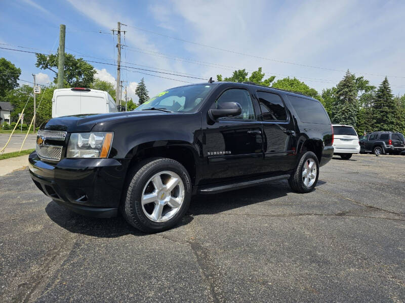 2012 Chevrolet Suburban for sale at DALE'S AUTO INC in Mount Clemens MI