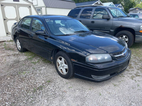 2004 Chevrolet Impala for sale at HEDGES USED CARS in Carleton MI