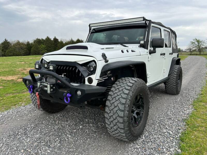 2014 Jeep Wrangler Unlimited for sale at TINKER MOTOR COMPANY in Indianola OK