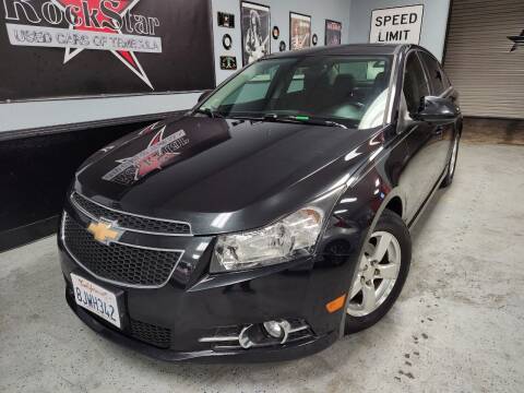 2013 Chevrolet Cruze for sale at ROCKSTAR USED CARS OF TEMECULA in Temecula CA