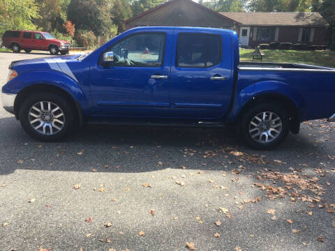 2013 Nissan Frontier for sale at Lou Rivers Used Cars in Palmer MA