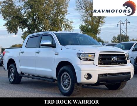 2013 Toyota Tundra for sale at RAVMOTORS in Burnsville MN