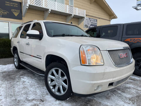 2014 GMC Yukon for sale at BELOW BOOK AUTO SALES in Idaho Falls ID