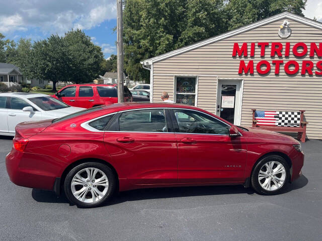 2014 Chevrolet Impala for sale at Mitrione Motors in Springfield, IL