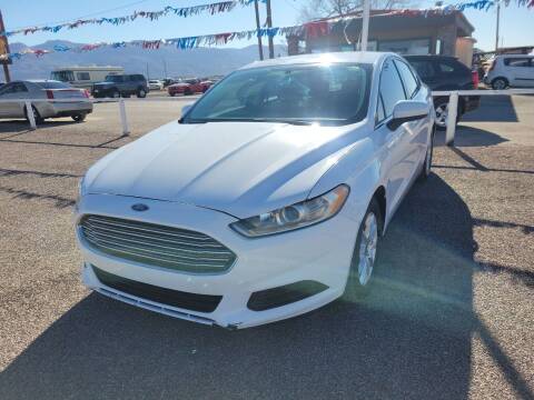 2016 Ford Fusion for sale at Bickham Used Cars in Alamogordo NM