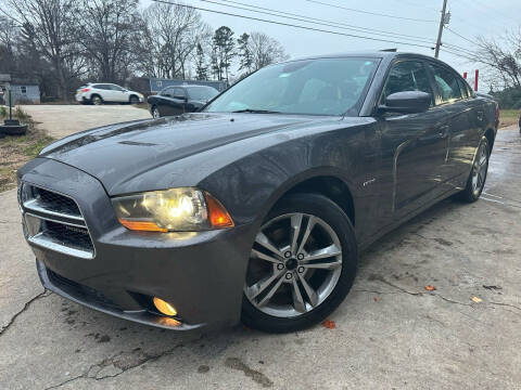 2014 Dodge Charger for sale at Gwinnett Luxury Motors in Buford GA