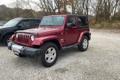 2012 Jeep Wrangler for sale at TIM'S AUTO SOURCING LIMITED in Tallmadge OH