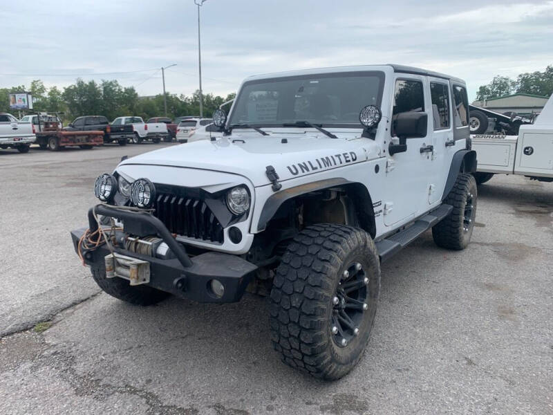 2015 Jeep Wrangler Unlimited for sale at LEE AUTO SALES in McAlester OK