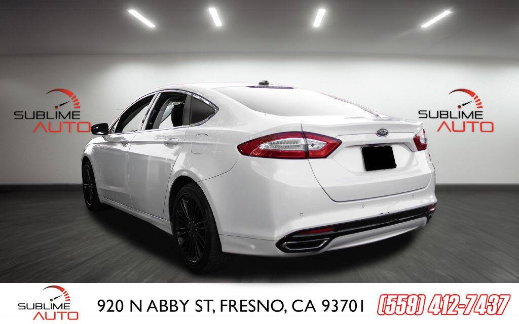 2014 Ford Fusion for sale at SUBLIME AUTO in Fresno, CA