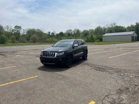 2011 Jeep Grand Cherokee for sale at Caruzin Motors in Flint MI