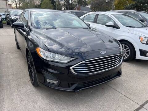 2019 Ford Fusion for sale at Martell Auto Sales Inc in Warren MI