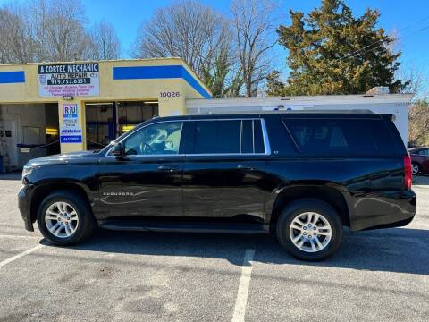 2015 Chevrolet Suburban for sale at A&A Auto Sales llc in Fuquay Varina NC