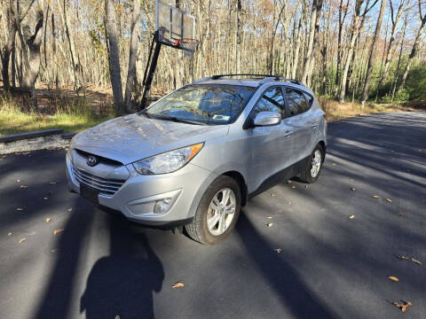 2013 Hyundai Tucson for sale at AFFORDABLE IMPORTS in New Hampton NY