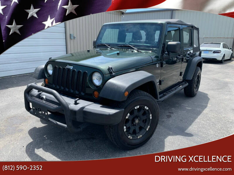 2011 Jeep Wrangler Unlimited for sale at Driving Xcellence in Jeffersonville IN