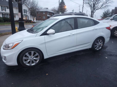 2014 Hyundai Accent for sale at Maximum Auto Group II INC in Cortland OH