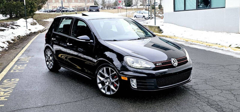 2013 Volkswagen GTI for sale at BOOST MOTORS LLC in Sterling VA