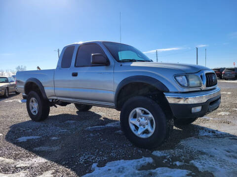 2003 Toyota Tacoma for sale at BERKENKOTTER MOTORS in Brighton CO