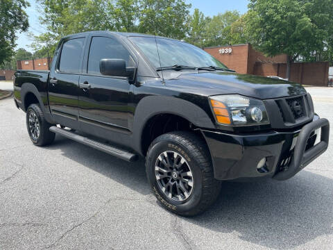 2013 Nissan Titan for sale at United Luxury Motors in Stone Mountain GA