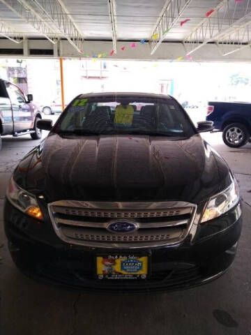 2012 Ford Taurus for sale at DNA Auto Sales in Rockford IL