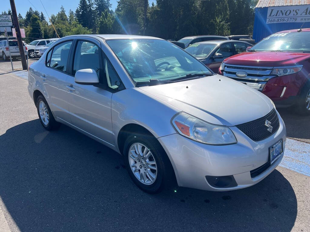 SILVER 2012 Suzuki SX4 LE LE 4dr Sedan 1