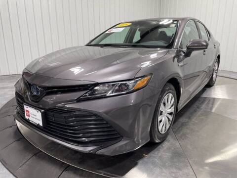 2019 Toyota Camry Hybrid for sale at HILAND TOYOTA in Moline IL