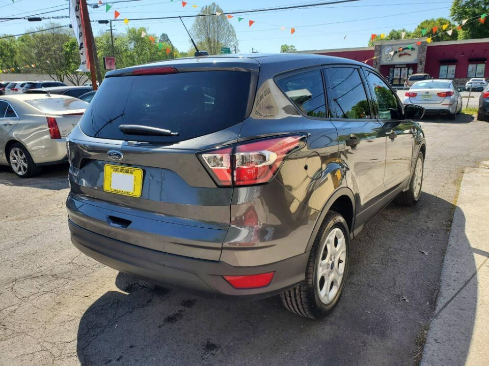 2017 Ford Escape for sale at DAGO'S AUTO SALES LLC in Dalton, GA