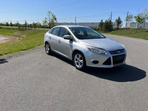 2013 Ford Focus for sale at BOOST MOTORS LLC in Sterling VA