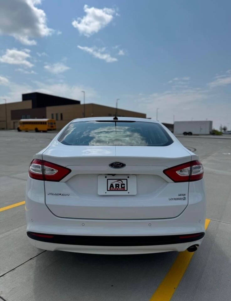 2013 Ford Fusion Hybrid for sale at Arc Auto Sales in Omaha, NE