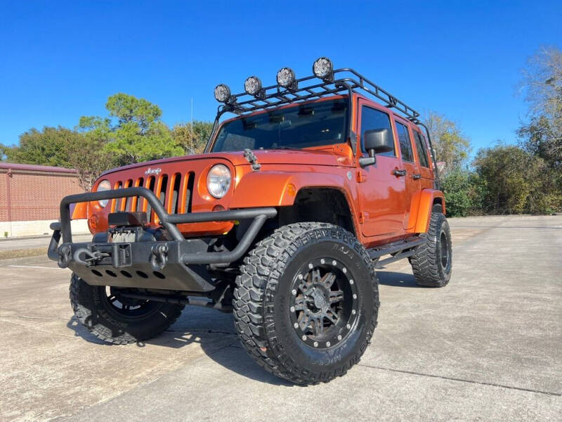 2011 Jeep Wrangler Unlimited for sale at Crown Auto Sales in Sugar Land TX