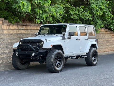 2012 Jeep Wrangler Unlimited for sale at H and S Auto Group in Canton GA