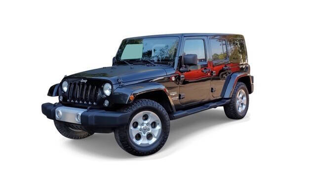 2014 Jeep Wrangler Unlimited for sale at Bowman Auto Center in Clarkston, MI