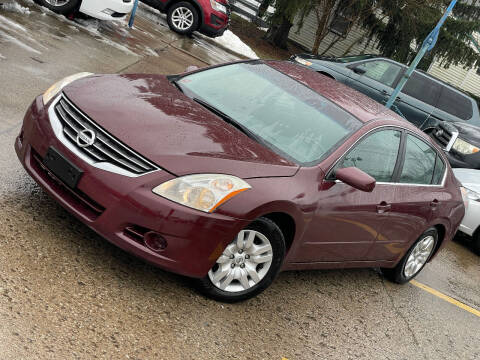 2012 Nissan Altima for sale at Exclusive Auto Group in Cleveland OH