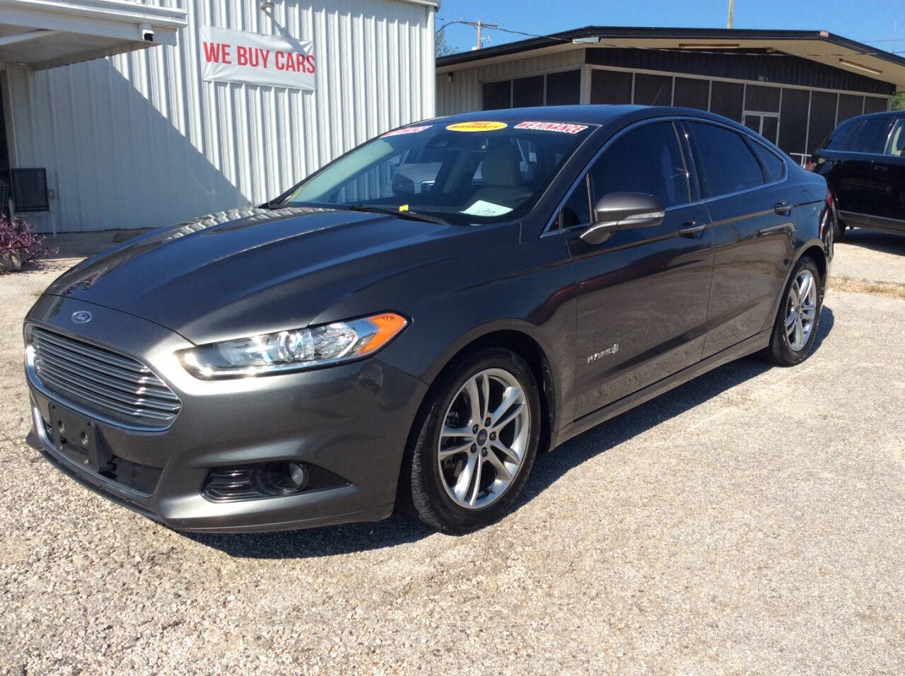 2015 Ford Fusion Hybrid for sale at SPRINGTIME MOTORS in Huntsville, TX