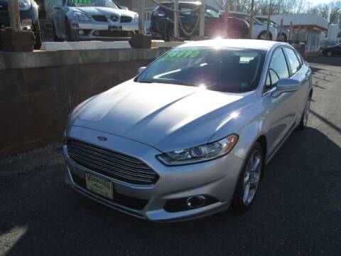 2015 Ford Fusion for sale at WORKMAN AUTO INC in Pleasant Gap PA