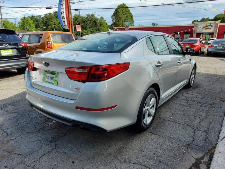 2014 Kia Optima for sale at DAGO'S AUTO SALES LLC in Dalton, GA