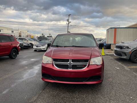 2014 Dodge Grand Caravan for sale at A1 Auto Mall LLC in Hasbrouck Heights NJ