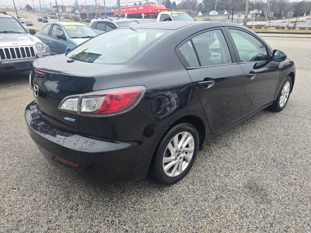 2013 Mazda Mazda3 for sale at QUEENSGATE AUTO SALES in York, PA