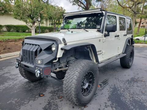 2010 Jeep Wrangler Unlimited for sale at E MOTORCARS in Fullerton CA