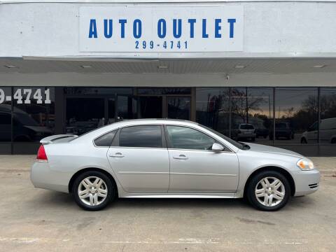 2012 Chevrolet Impala for sale at Auto Outlet in Des Moines IA