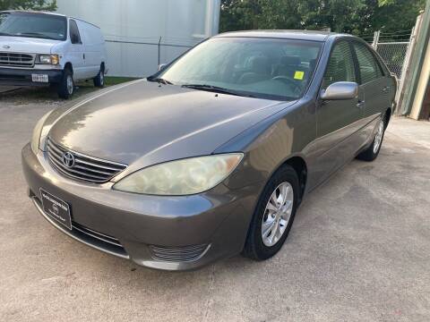2006 Toyota Camry for sale at KM Motors LLC in Houston TX