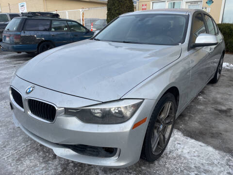 2012 BMW 3 Series for sale at BELOW BOOK AUTO SALES in Idaho Falls ID
