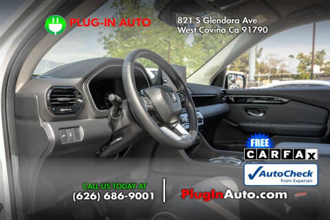 2023 Honda Pilot EX-L w/Rear Captain's Chairs