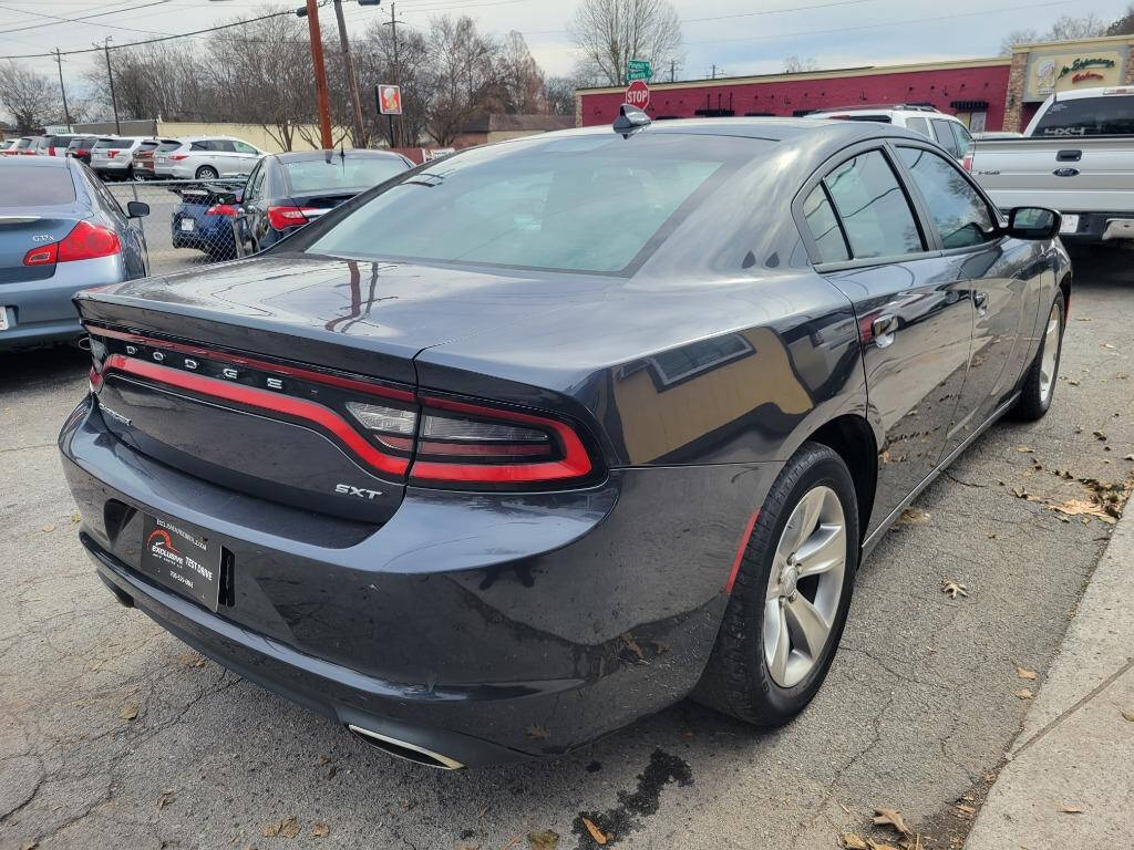 2017 Dodge Charger for sale at DAGO'S AUTO SALES LLC in Dalton, GA