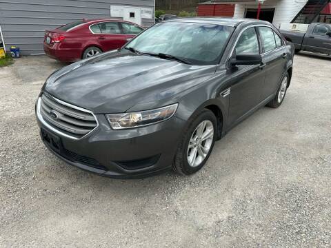 2016 Ford Taurus for sale at LEE'S USED CARS INC ASHLAND in Ashland KY