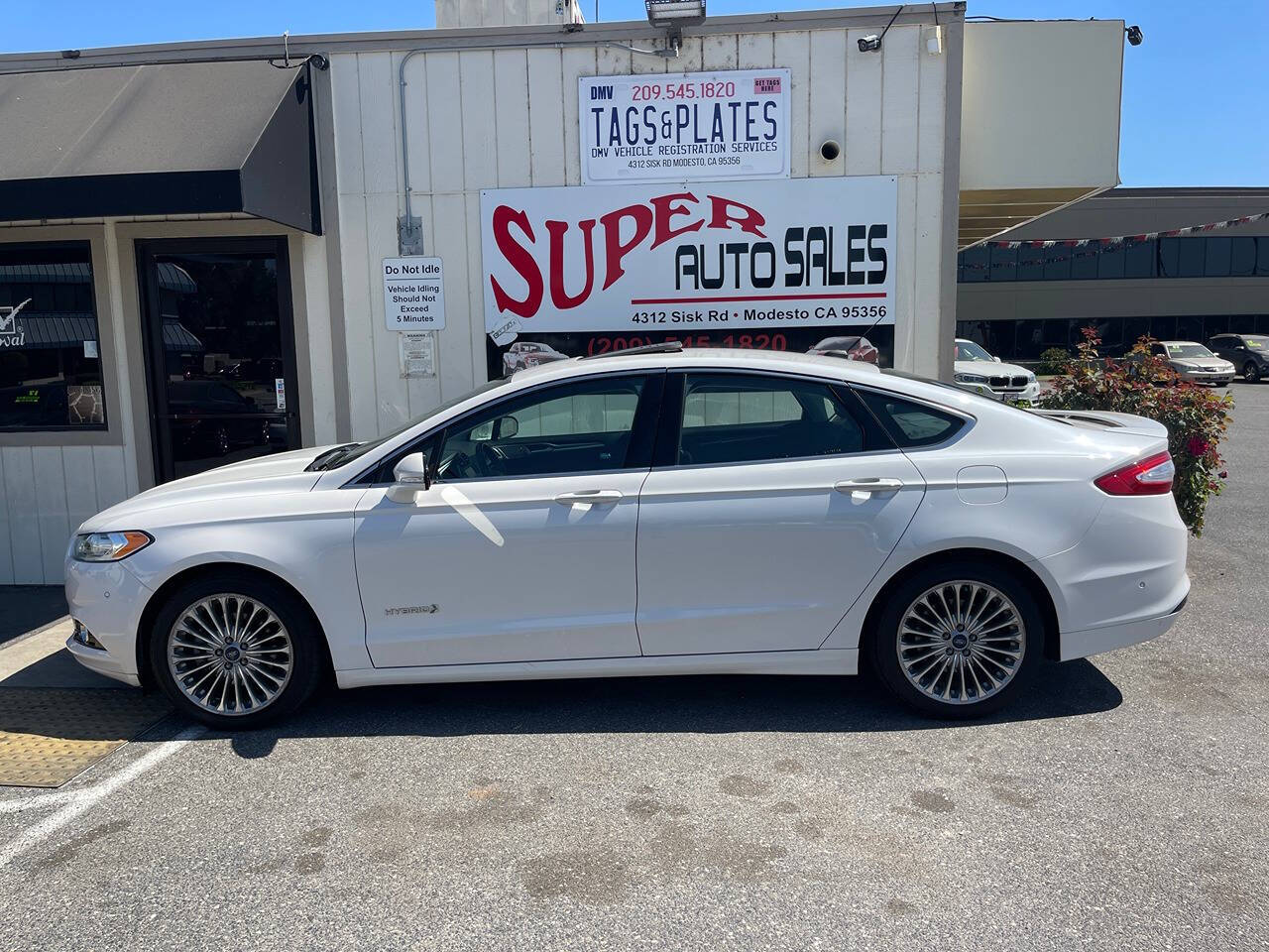 2014 Ford Fusion Hybrid for sale at Super Auto Sales Modesto in Modesto, CA